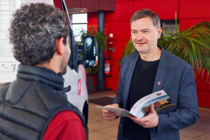 Renault trucks sellsperson advising a customer
